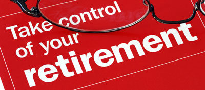 A red sign that says control your retirement.