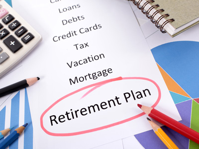 A retirement plan is written on top of the paper.